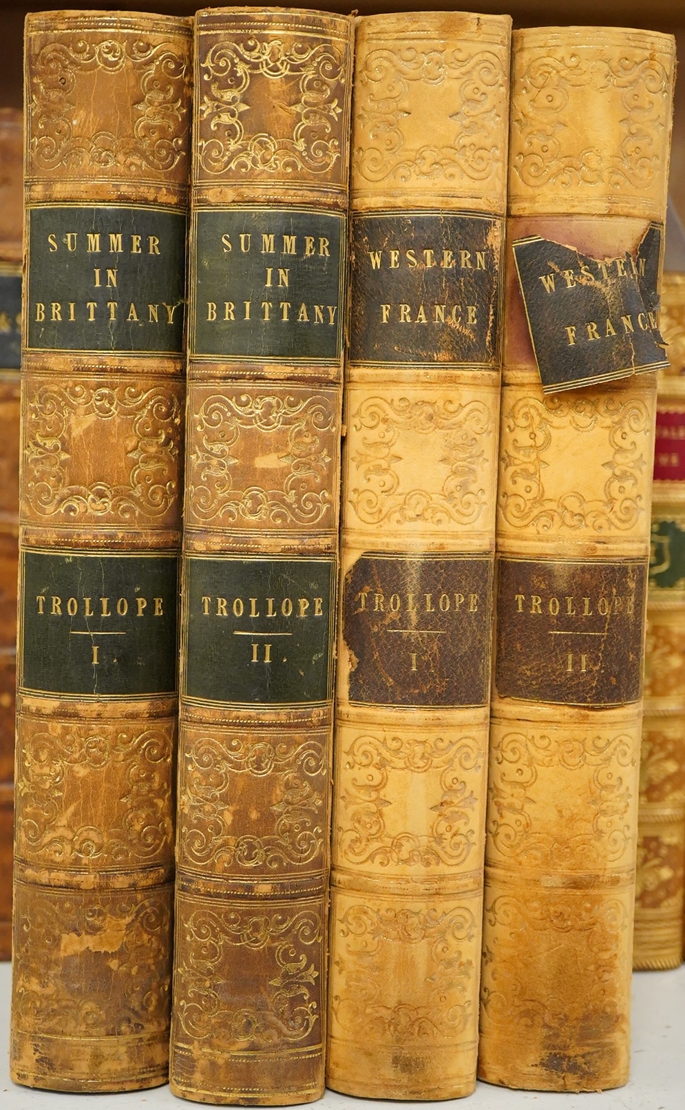 Trollope, T(homas) Adolphus - A Summer in Brittany, edited by Franses Trollope, 1st edition, 2 vols., with 10 etched plates by A. Hervieu, 2 hand-coloured lithograph frontis., etched title-page vignettes, gilt-decorated